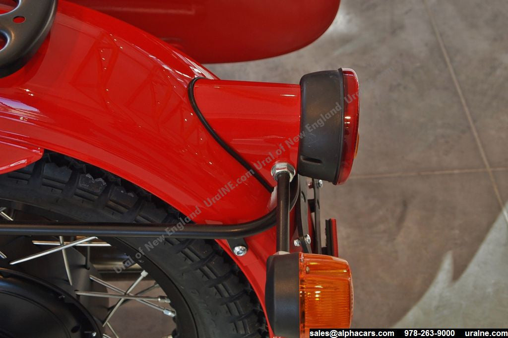 This photo shows the Retro Rear Motorcycle Light Adapter, as part of the complete Retro Rear Light Kit (including gasket and light assembly).